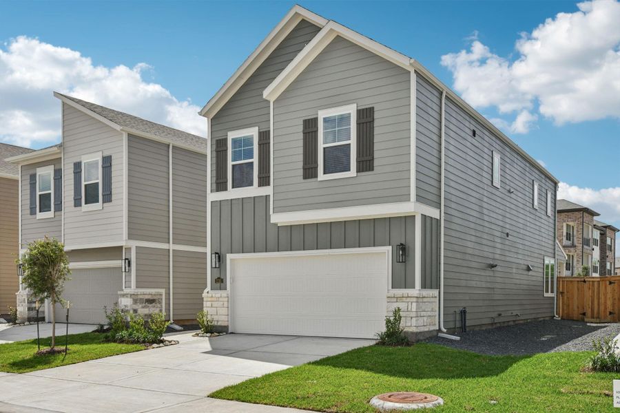 Front exterior of a new home in Parkway Commons - City Series, Missouri City, TX, highlighting curb appeal (Image 1). Front exterior of a new home in Parkway Commons - City Series, Missouri City, TX, highlighting curb appeal (Image 1).