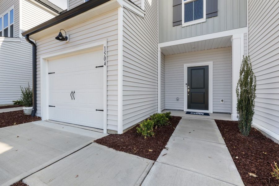 Exterior details and patio area of a home in Flemingfield, Greensboro (Image 3).