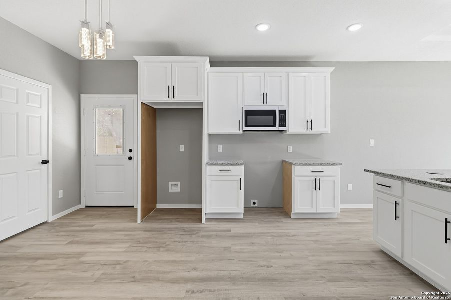 Furnished interior view inside a new home in , San Antonio (Image 9).