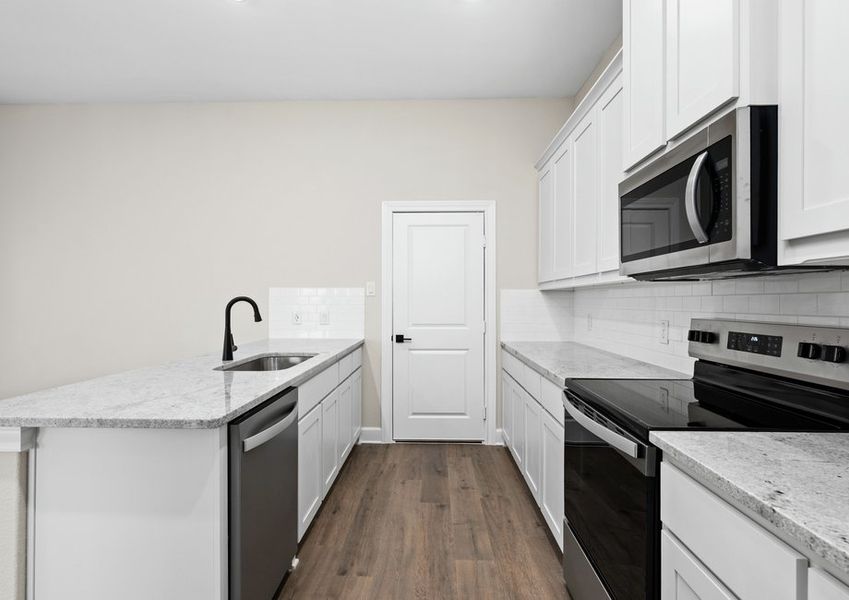 The kitchen has energy-efficient appliances.