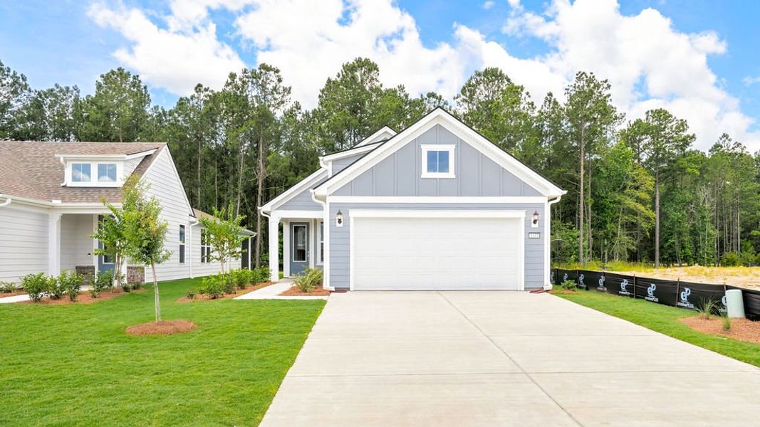 Front exterior of a new home in Sun City Hilton Head, Bluffton, SC, highlighting curb appeal (Image 20).
