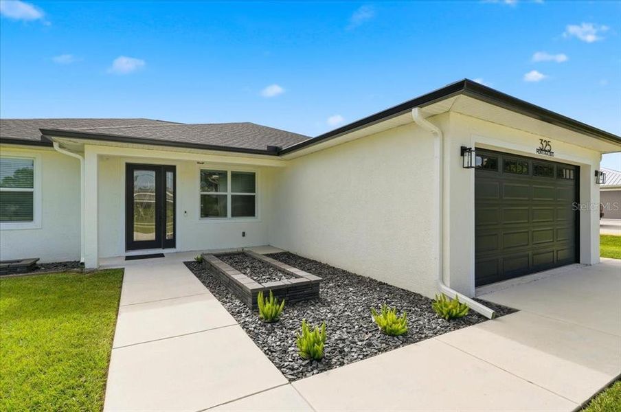 Exterior details and patio area of a home in , Sebring (Image 3).