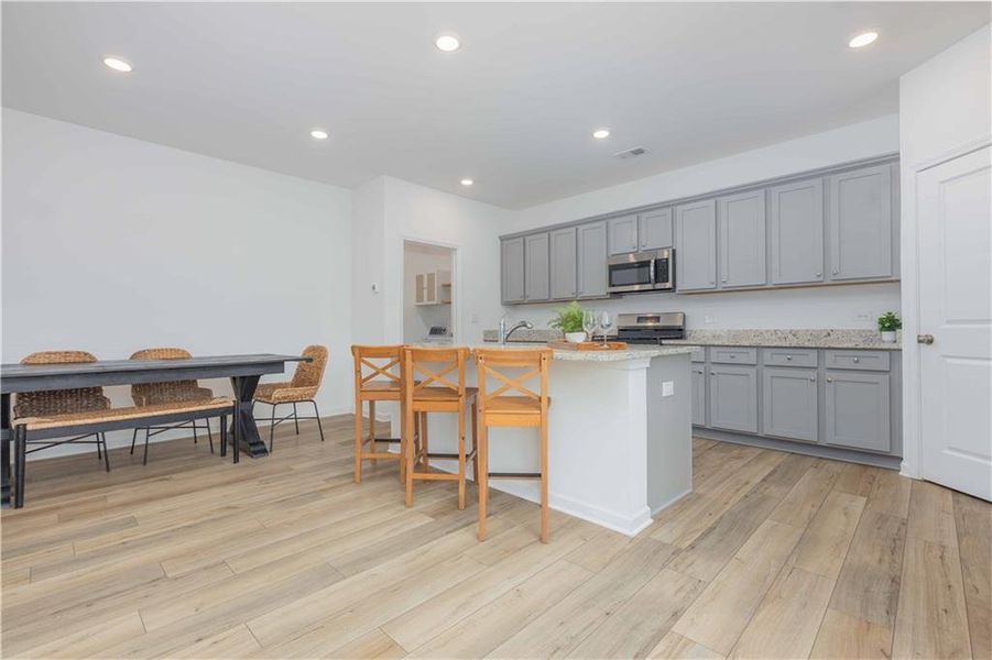 Furnished interior view inside a new home in Creekside at Farmers Crossing, Ball Ground (Image 10).