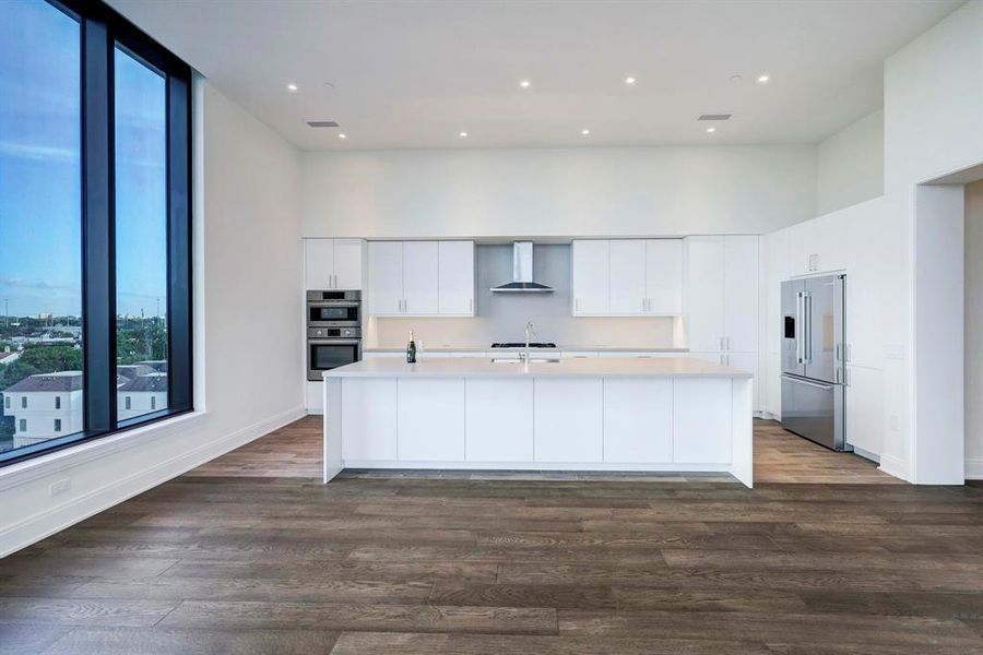 Thanks to this beautifully planned open kitchen, cooks won't miss a single minute of the conversation.