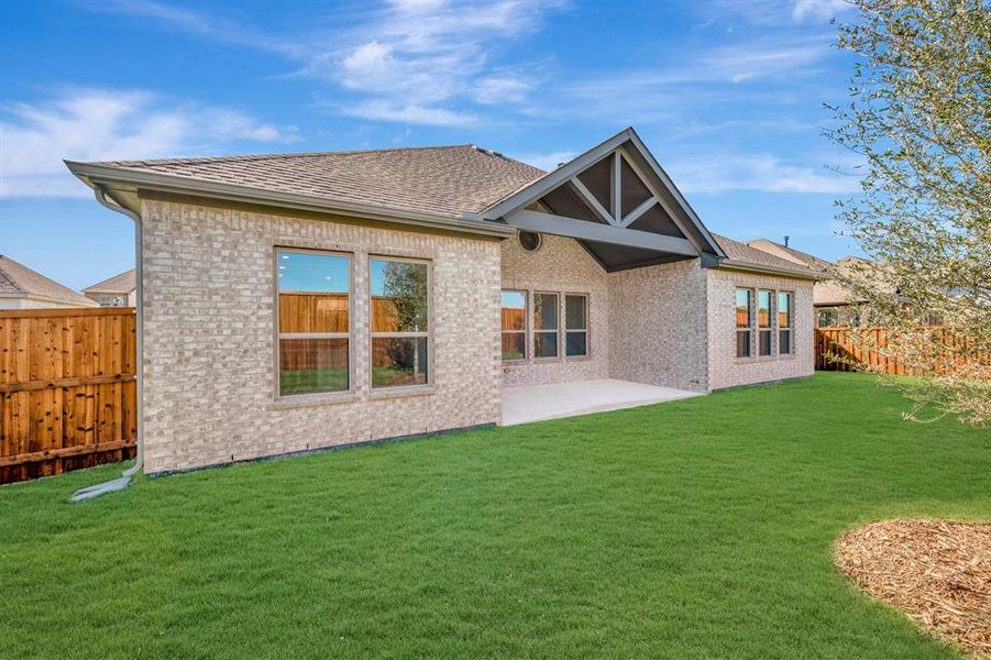 Exterior details and patio area of a home in Kreymer at the Park, Wylie (Image 3).