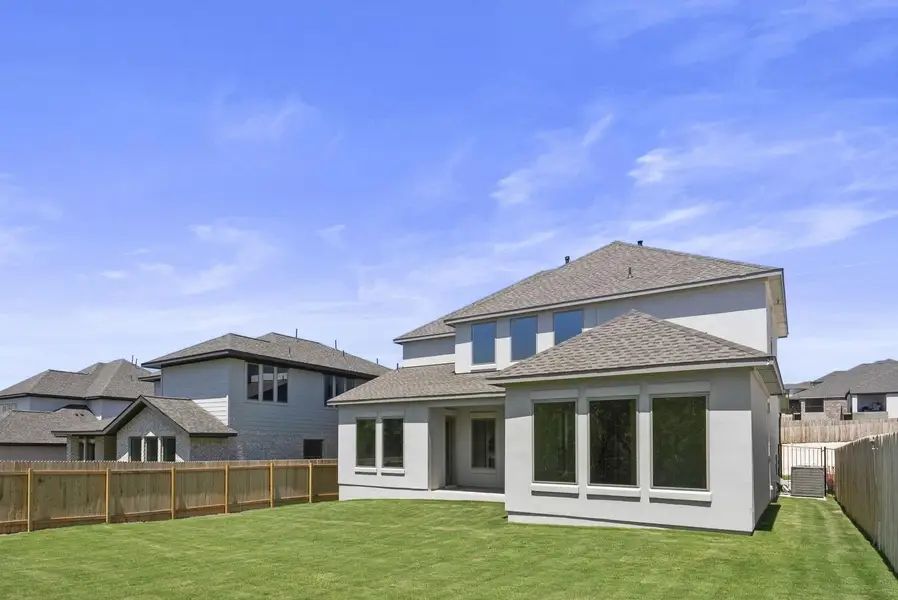 Exterior details and patio area of a home in Santa Rita Ranch - Eldorado, Liberty Hill (Image 2).