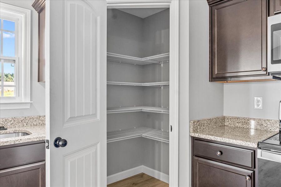 Representative furnished interior of a home built from the Whitney by Enchanted Homes in Ballentine Ridge, Lyman (Image 8).