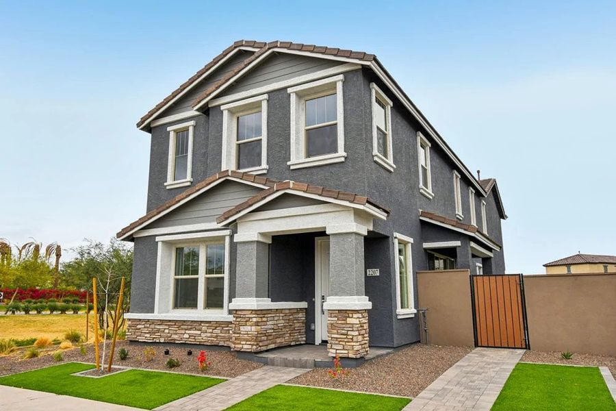 Representative exterior photo of a completed home built from the Pinnacle by Ashton Woods in Union Park at Norterra Phase 2, Phoenix, AZ (Image 22).