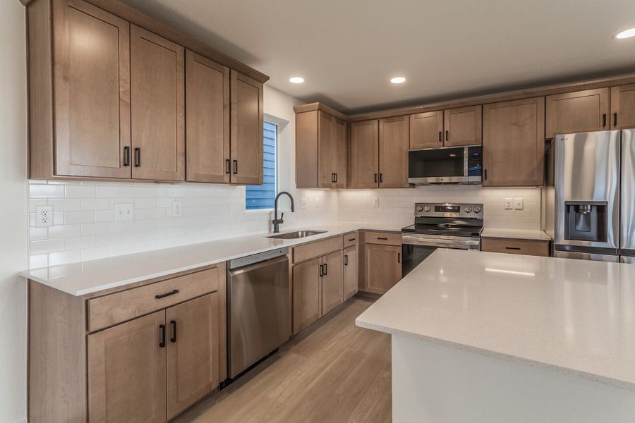 Furnished interior view inside a new home in Prairie Song Cottages, Windsor (Image 11).
