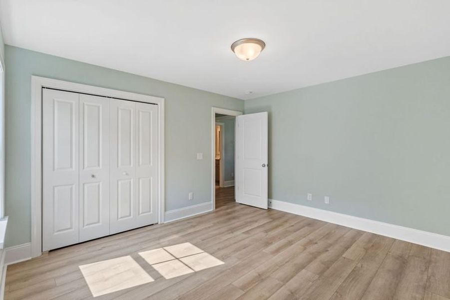 Spacious, unfurnished interior of a new home in Osprey Landing, Southport (Image 24).