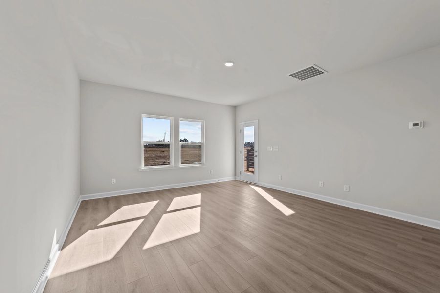 Spacious, unfurnished interior of a new home in Blue Heron Retreat: Villas, Little River (Image 15).