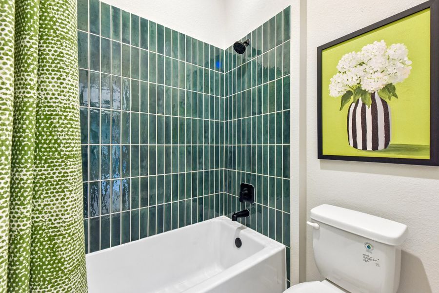 Representative furnished interior of a home built from the Enfield by Taylor Morrison in Village Grove, Dripping Springs (Image 36).