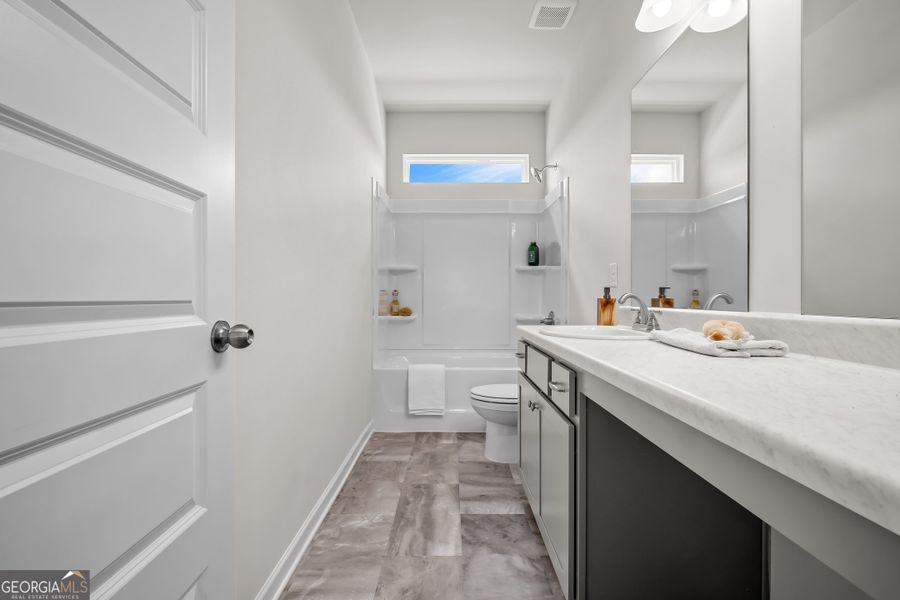 Furnished interior view inside a new home in Cobblestone Crossing Commons, Warner Robins (Image 44).