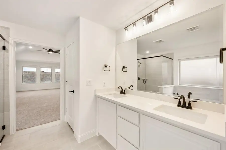 Furnished interior view inside a new home in Villages of Hurricane Creek, Anna (Image 8).