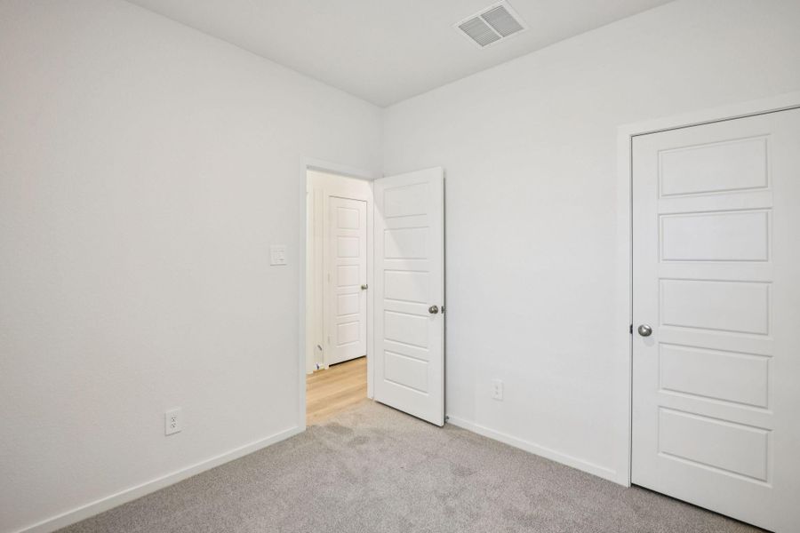 Spacious, unfurnished interior of a new home in Riviera Pines - Traditional Series, Huffman (Image 29).