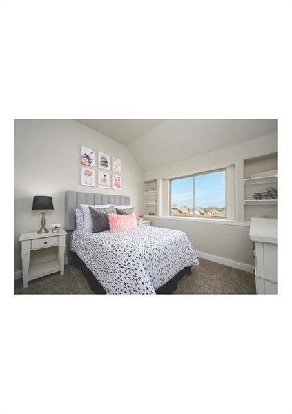 Bedroom featuring dark colored carpet and lofted ceiling