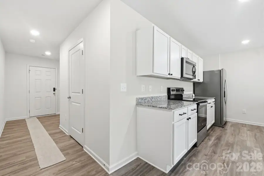 Furnished interior view inside a new home in Trivium, Newton (Image 5).