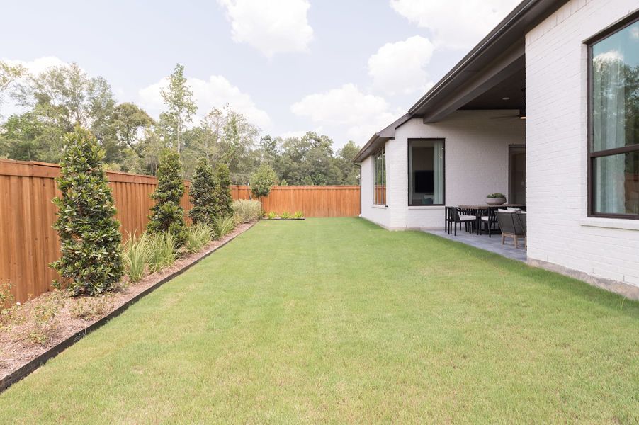 Representative exterior details of a home built from the Carignan by Tri Pointe Homes in Woodson’s Reserve, Spring (Image 31).