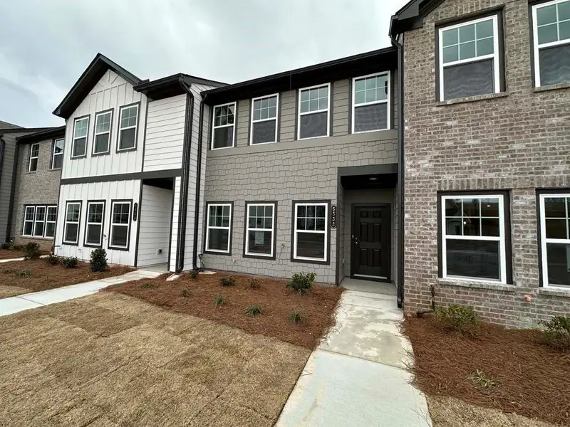 Exterior details and patio area of a home in Laurelwood, Douglasville (Image 2). Exterior details and patio area of a home in Laurelwood, Douglasville (Image 2).