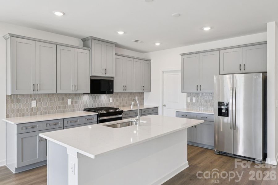 Photo is not of the actual home, but is an inspirational photo of builder’s model home and may depict options, furnishings, and/or decorator features that are not included