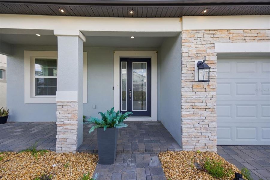 Exterior details and patio area of a home in Whispering Oaks Preserve, Wesley Chapel (Image 38). Exterior details and patio area of a home in Whispering Oaks Preserve, Wesley Chapel (Image 38).