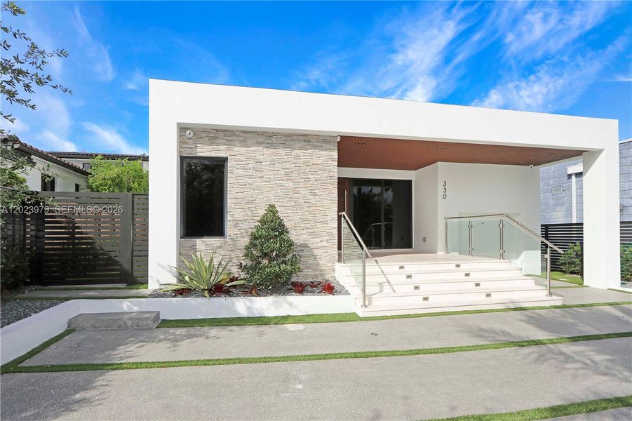 Exterior details and patio area of a home in , Miami (Image 2). Exterior details and patio area of a home in , Miami (Image 2).
