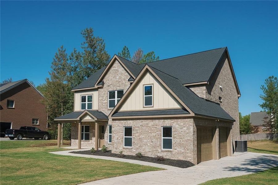 Front exterior of a new home in , Loganville, GA, highlighting curb appeal (Image 28).