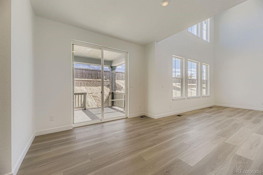 Spacious, unfurnished interior of a new home in Newlin Crossing: The Monarch Collection, Parker (Image 11).