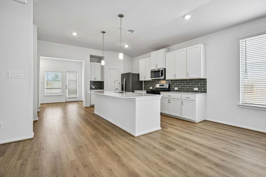 Furnished interior view inside a new home in Riviera Pines - Premier Series, Huffman (Image 14).