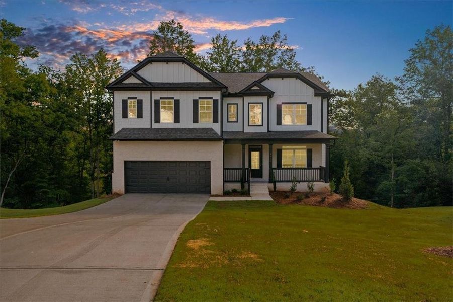Front exterior of a new home in River Rock, Ball Ground, GA, highlighting curb appeal (Image 26).