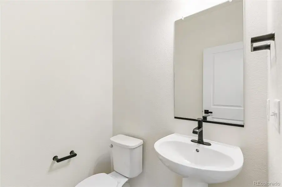 Furnished interior view inside a new home in Turnberry Villas, Commerce City (Image 5).