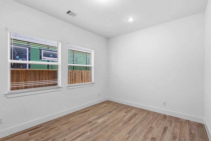 Spacious, unfurnished interior of a new home in Meridiana, Manvel (Image 16).