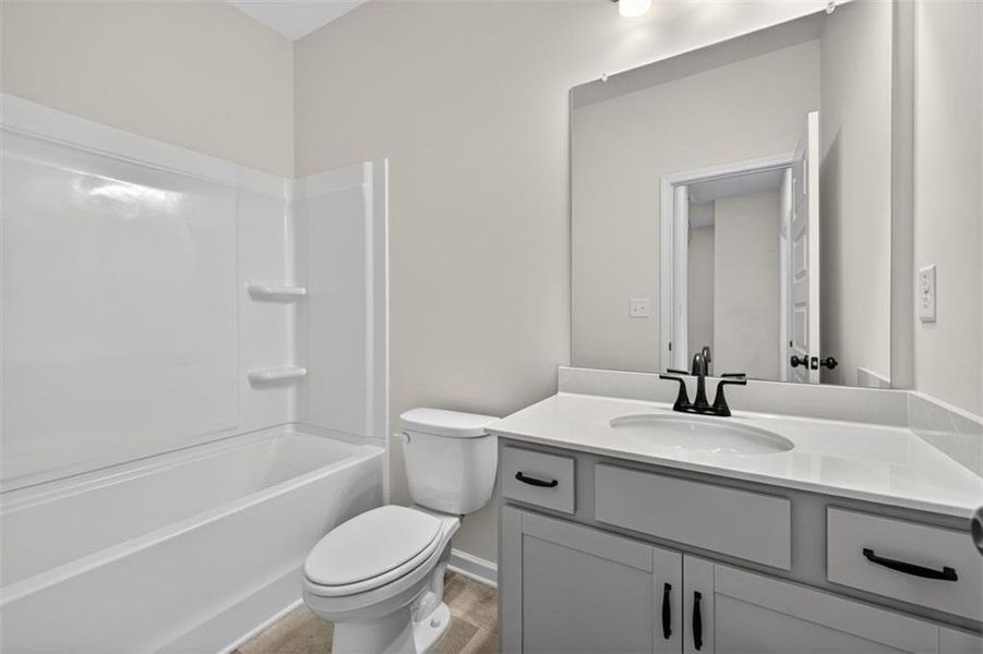 Furnished interior view inside a new home in Sanders Park, Austell (Image 9).