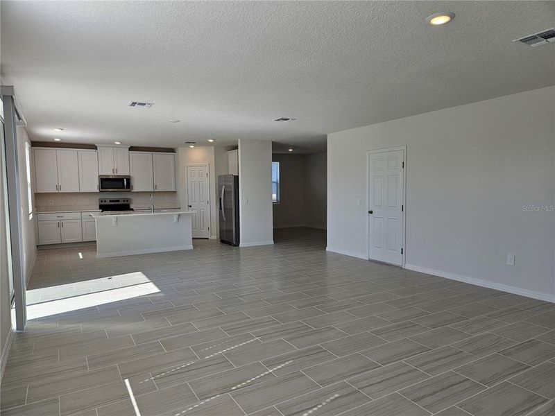 Spacious, unfurnished interior of a new home in Lawson Dunes - Signature Series, Haines City (Image 22).