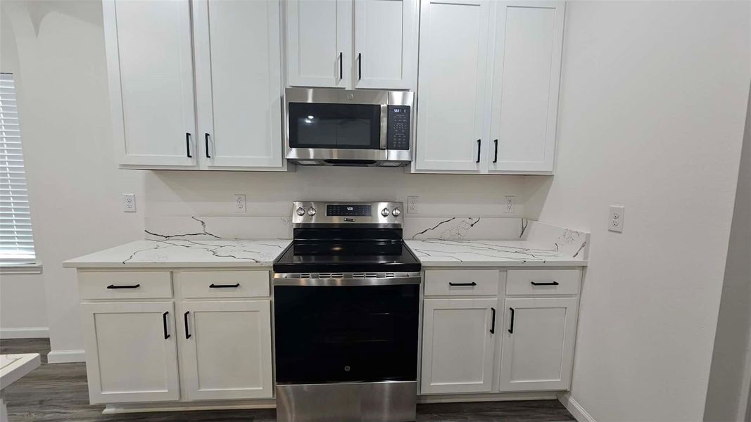 Furnished interior view inside a new home in , Kenefick (Image 5).
