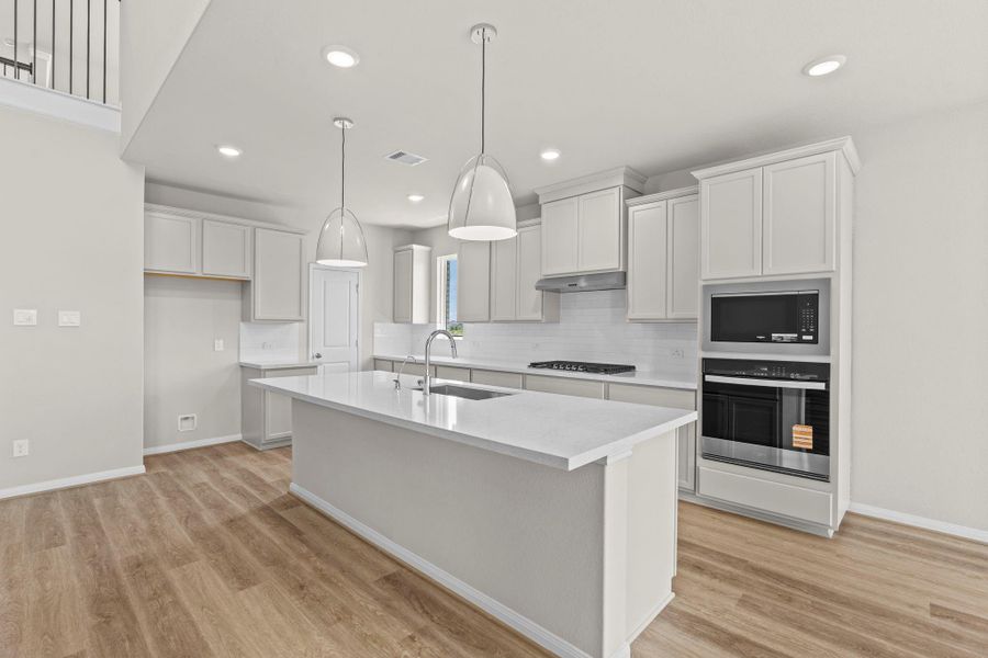 Furnished interior view inside a new home in Bridgeland, Cypress (Image 10).