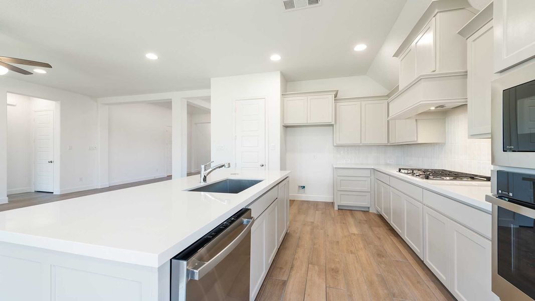 Representative furnished interior of a home built from the 2187W by Perry Homes in 6 Creeks 50', Kyle (Image 11).