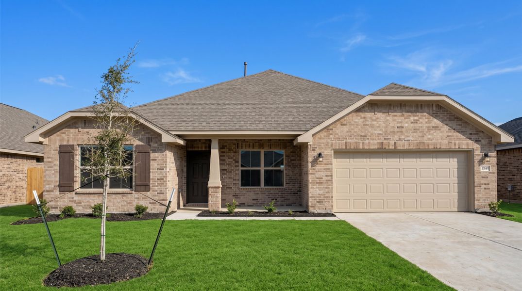 Front exterior of a new home in Cobblestone, Texas City, TX, highlighting curb appeal (Image 1). Front exterior of a new home in Cobblestone, Texas City, TX, highlighting curb appeal (Image 1).