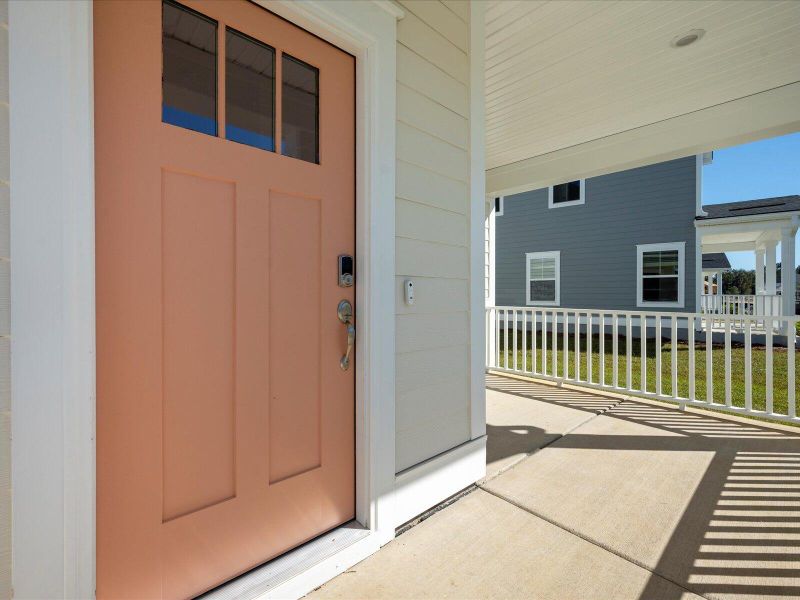 Exterior details and patio area of a home in The Coves at Lakes of Cane Bay, Summerville (Image 4).