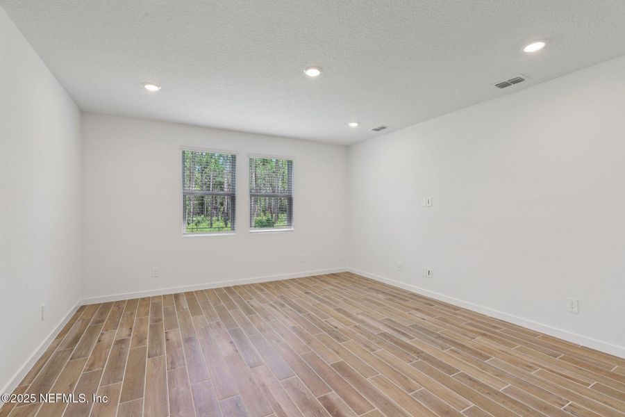Spacious, unfurnished interior of a new home in Colbert Landings, Palm Coast (Image 24).