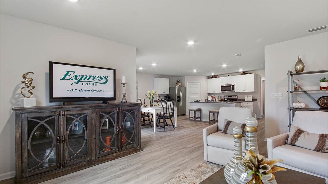 Representative furnished interior of a home built from the Cali by D.R. Horton in Owl's Head East, Freeport (Image 14).