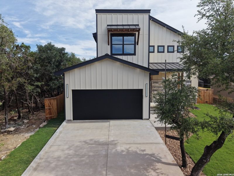 Front exterior of a new home in , Spring Branch, TX, highlighting curb appeal (Image 19).