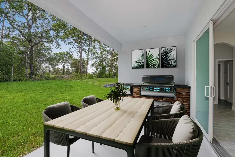 Exterior details and patio area of a home in Pinecone Reserve, Brooksville (Image 4).