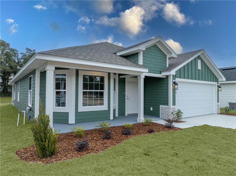 Front exterior of a new home in Briarwood, Alachua, FL, highlighting curb appeal (Image 2). Front exterior of a new home in Briarwood, Alachua, FL, highlighting curb appeal (Image 2).