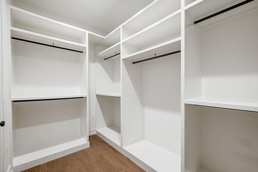 Primary closet with custom built-ins.