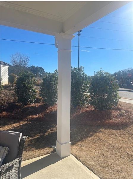 Exterior details and patio area of a home in Courtyards at Traditions, Cumming (Image 3).
