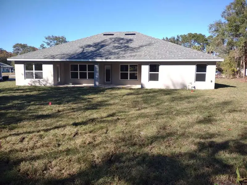 Exterior details and patio area of a home in , Ocala (Image 15).