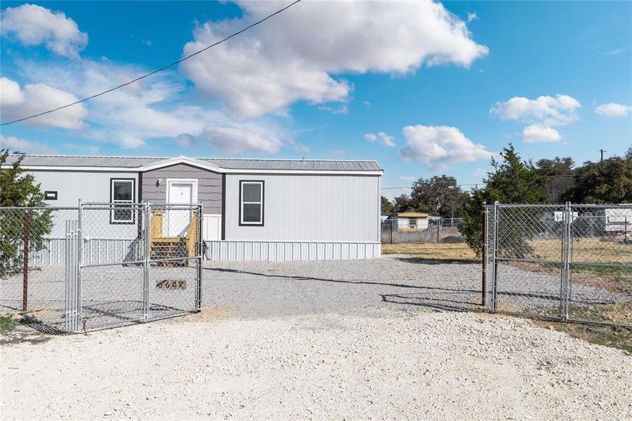 Exterior details and patio area of a home in , Brownwood (Image 18). Exterior details and patio area of a home in , Brownwood (Image 18).