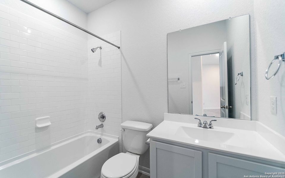 Furnished interior view inside a new home in Red Hawk Landing, San Antonio (Image 3).