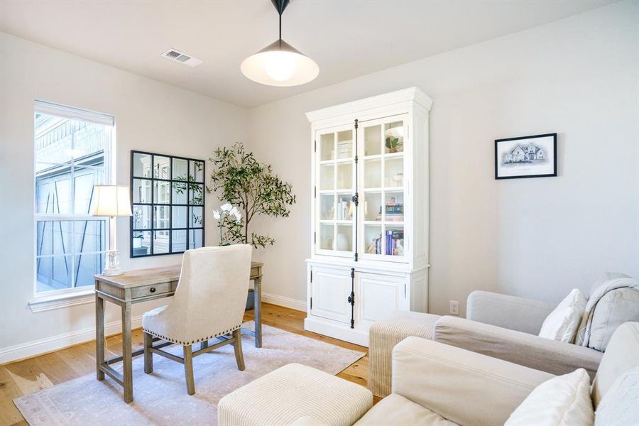 A Space to Think Clearly - A dedicated office filled with natural light and hardwood floors—ideal for working from home, managing the day, or carving out a quiet moment away from the bustle of daily life. A Space to Think Clearly - A dedicated office filled with natural light and hardwood floors—ideal for working from home, managing the day, or carving out a quiet moment away from the bustle of daily life.